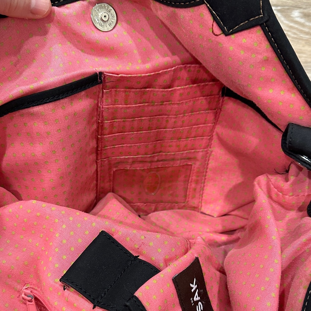 The SAK Chic Black Tote Bag with Pink and Lime Green Polka Dot Interior - Picture 9 of 16
